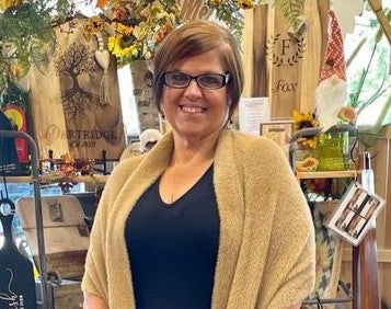 Dawn Khorsand-Sister of Nicole, She always will help you find the perfect gift. She's an expert with the puzzle walls and will get excited helping create a keepsake gift for any occasion.