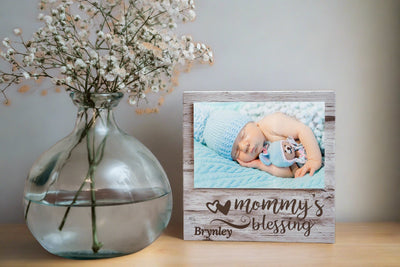 engraved into the frame"mommy's blessings and baby's name