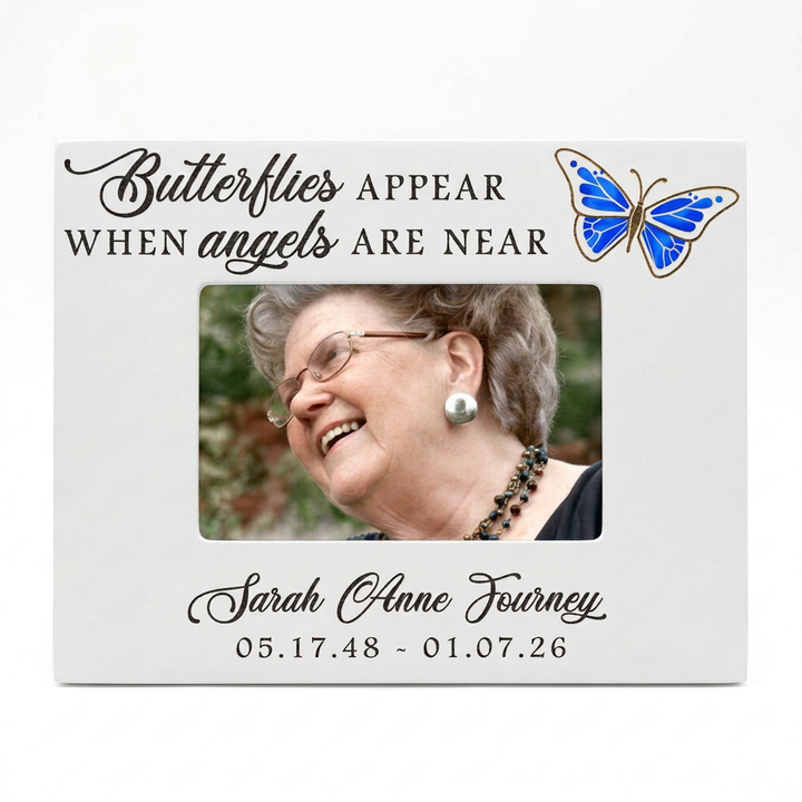 White butterfly memorial frame with color portrait, landscape